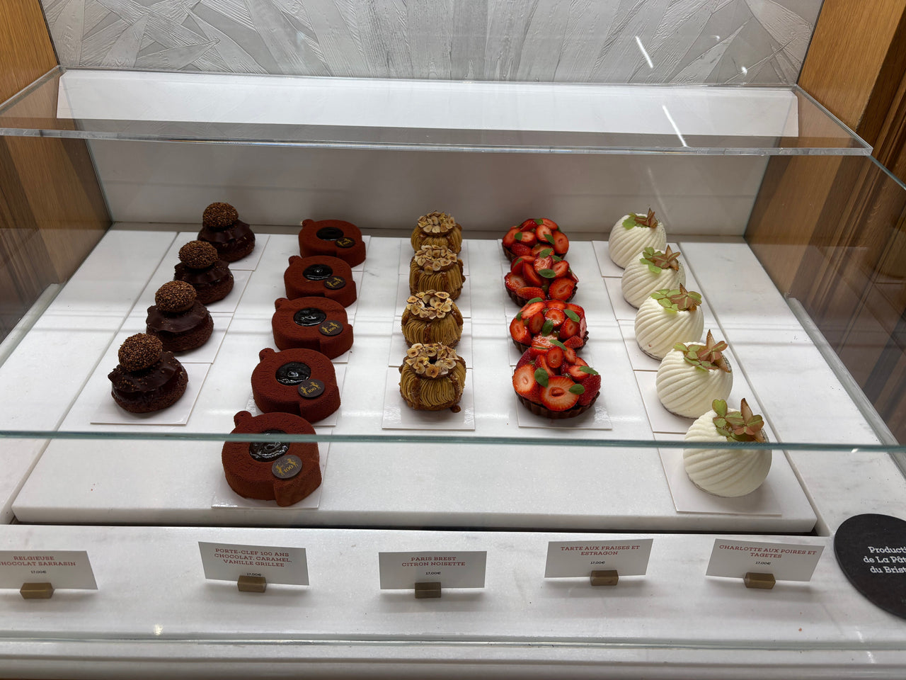 Tiny shop, huge flavors. Explore the magic of L'Épicerie, where croissants, foie gras, and world-class tarts await those willing to wait (a few fashionable minutes).
